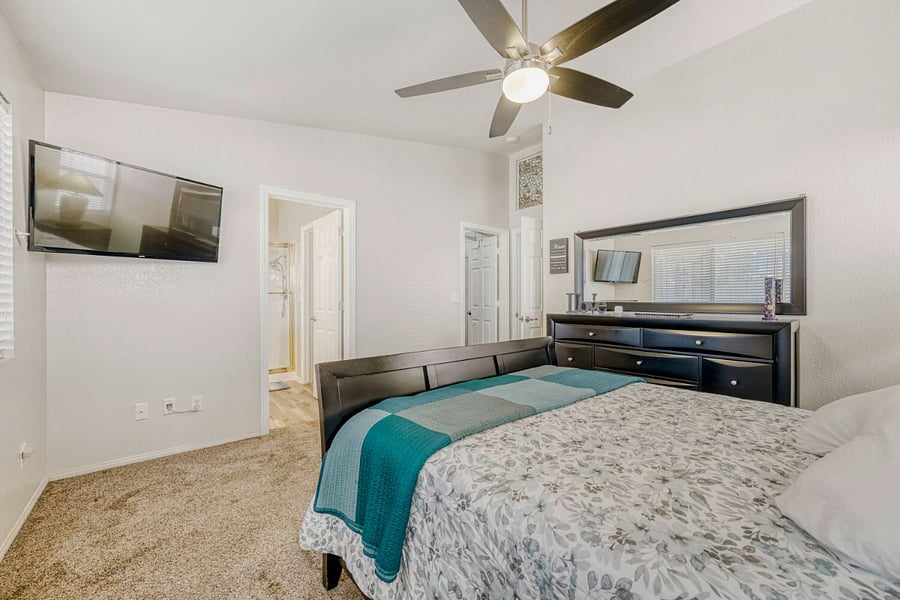 Primary bedroom with TV