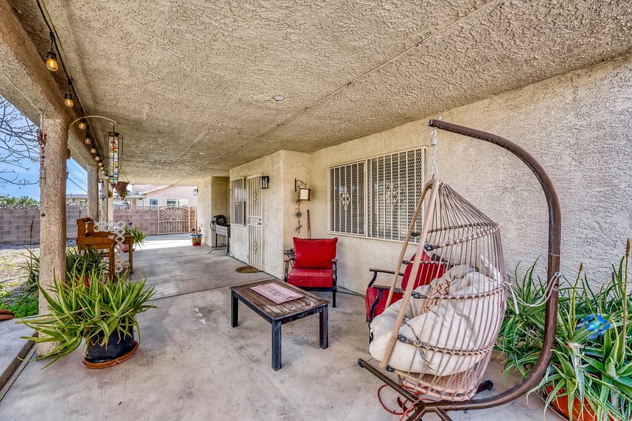 Covered backyard and seating area