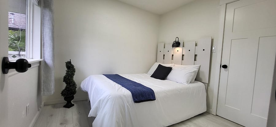 Cozy room Ashley full-queen size bed. (Inventory items)