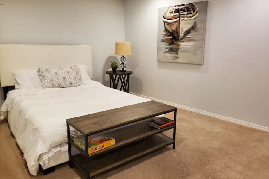 Alternate view of the finished basement with full bed.
