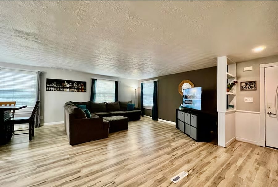 Main living room with open layout and natural light