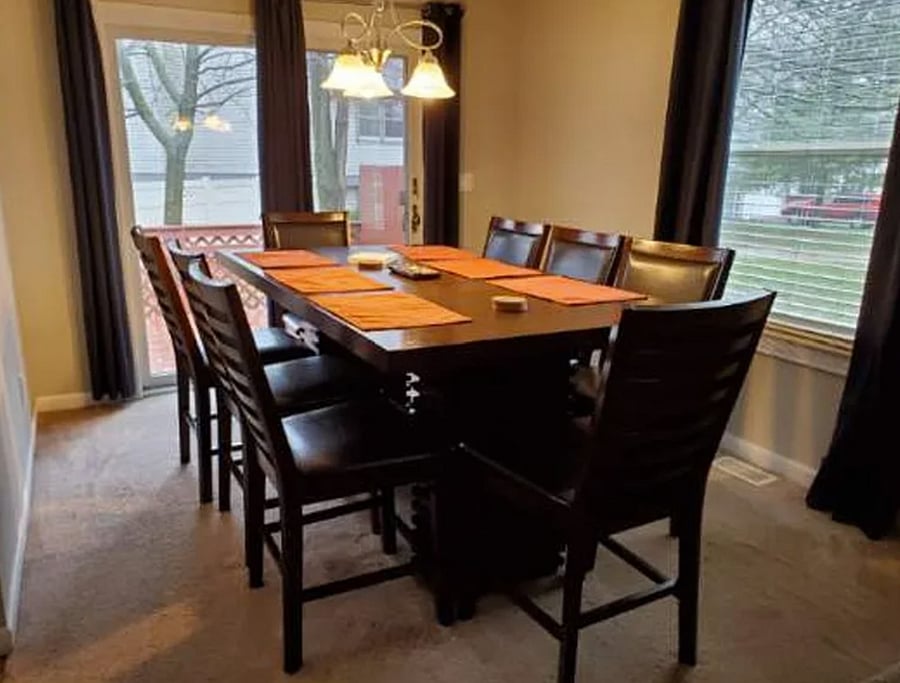 Dedicated dining area with seating for family meals or work