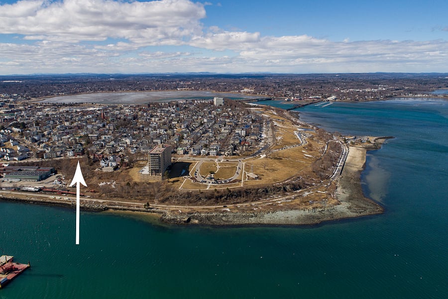 Munjoy Hill neighborhood, arrow shows building (red brick, green trim). Fort Allen Park in foreground with horseshoe drive, Eastern Prom park to right beyond.