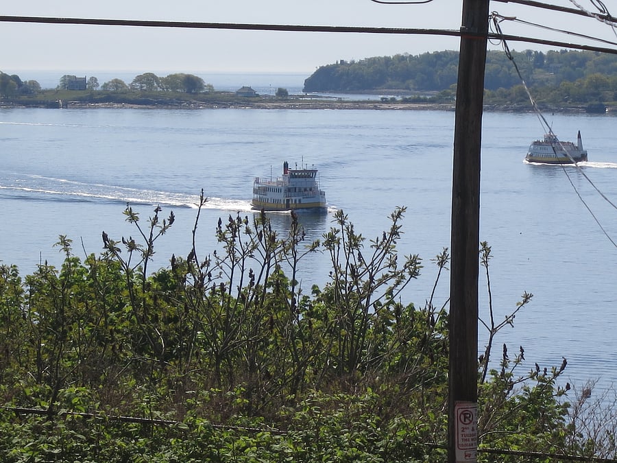 Seasonal view across Fore Street from the building, showing ferries running to the nearby islands.