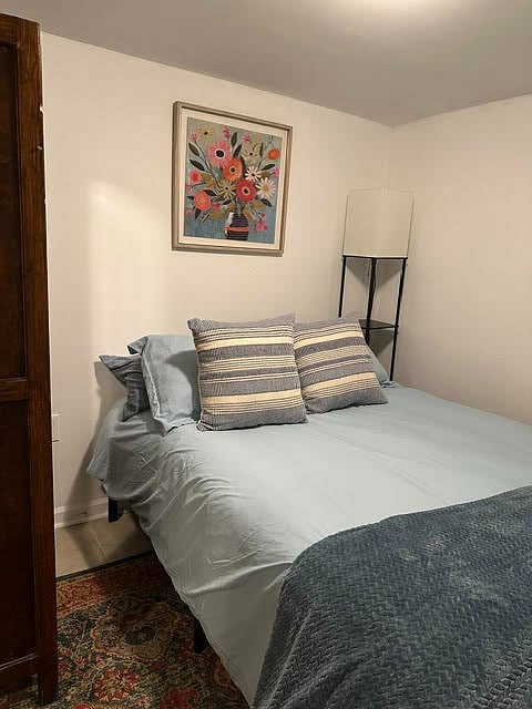 Bedroom with window AC/Heat