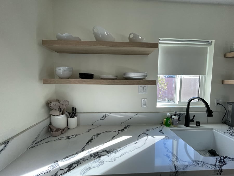 Ample counter space and natural light with blackout shades.