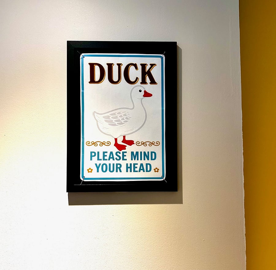 DUCK!! just a bit under the 4-5' loft ceiling - before you comfortably can sit, lounge, work, sleep - on the bed.