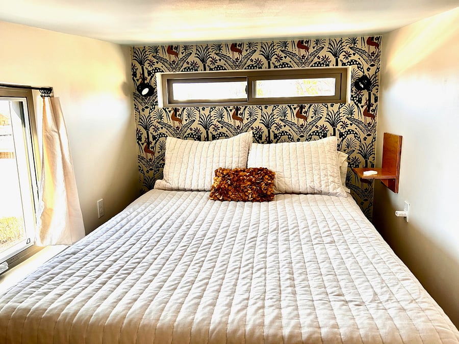 Very inviting loft space feels spacious and cozy when on the bed - then heads up! some crouching is required when standing. Surprisingly manageable too!