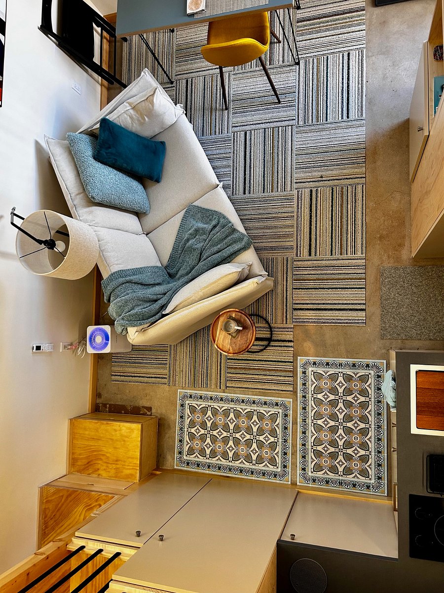 Birds eye view of main living room and floor plan.
