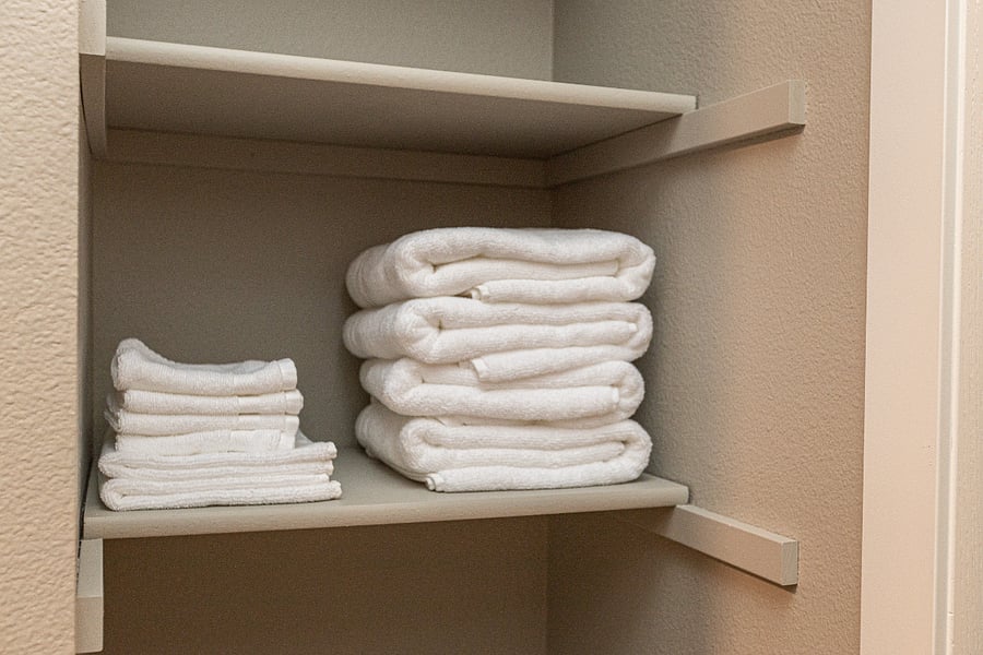 Shelving outside of main bathroom