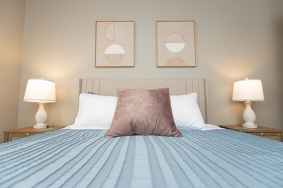 Nightstands on both sides of the bed