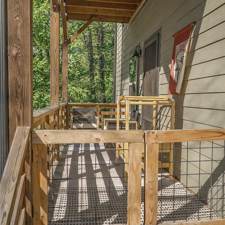 enclosed front entry porch with sitting area and sensory table for children