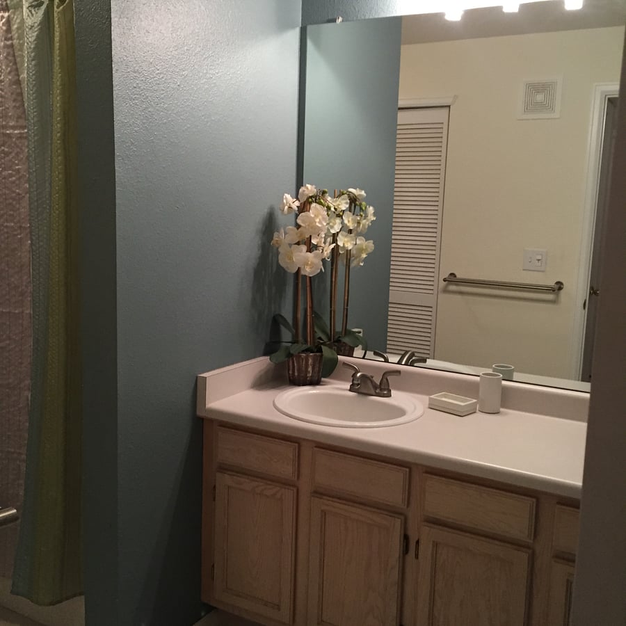 Clean, well-maintained bathroom with full tub/shower