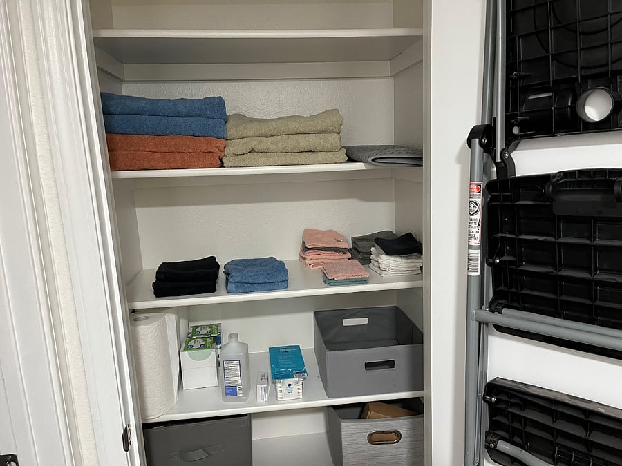 Closet with spare linen and towels and washcloths