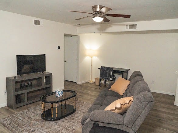 Living room looking into secondary bedroom