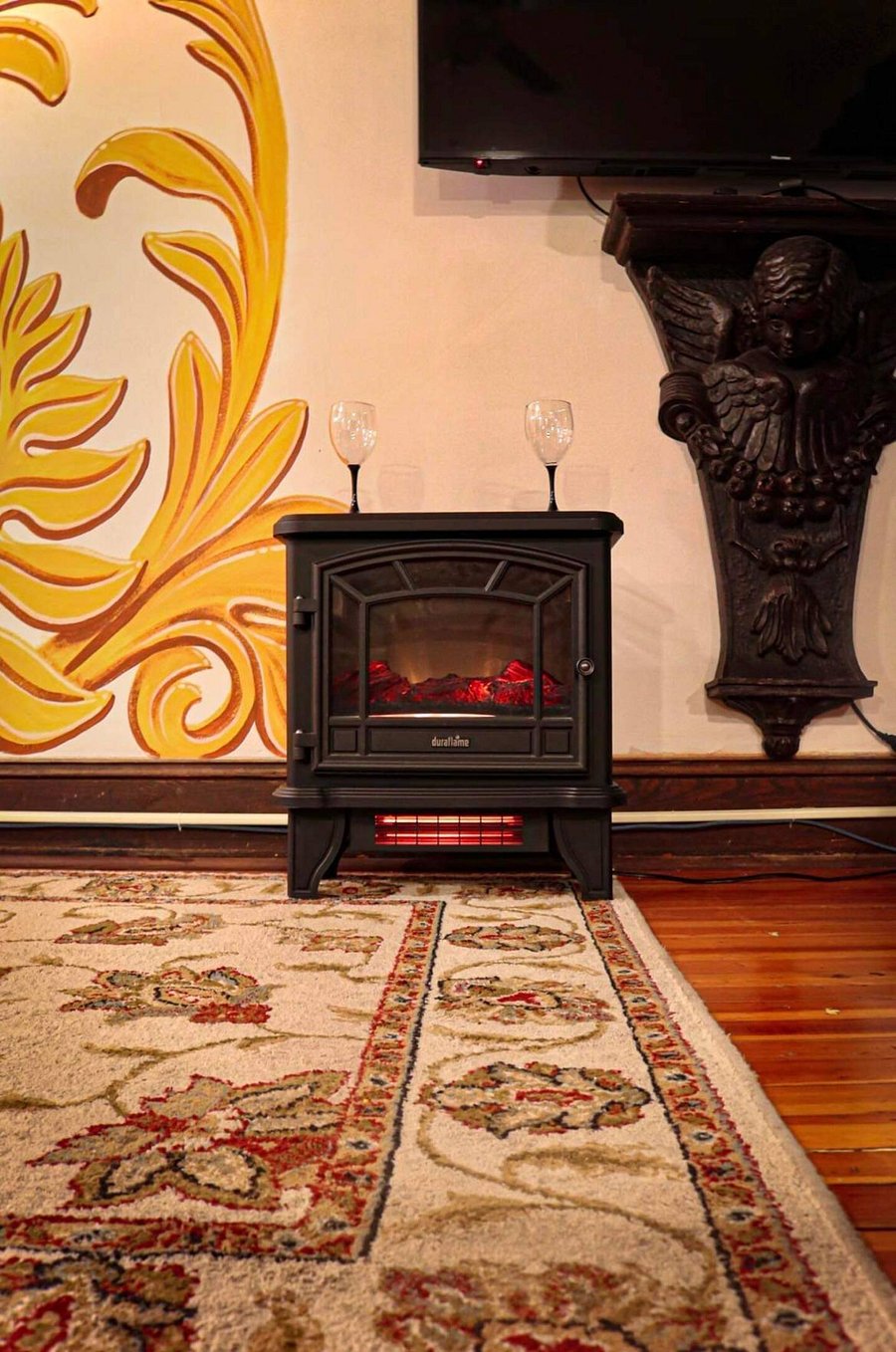 We currently have a portable Duraflame Electric Fireplace to make the chilly winter nights extra cozy ;)
