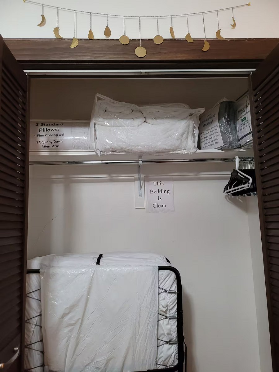 The Twin Roll-Away bed is stored in the bedroom closet along with extra Clean Pillows