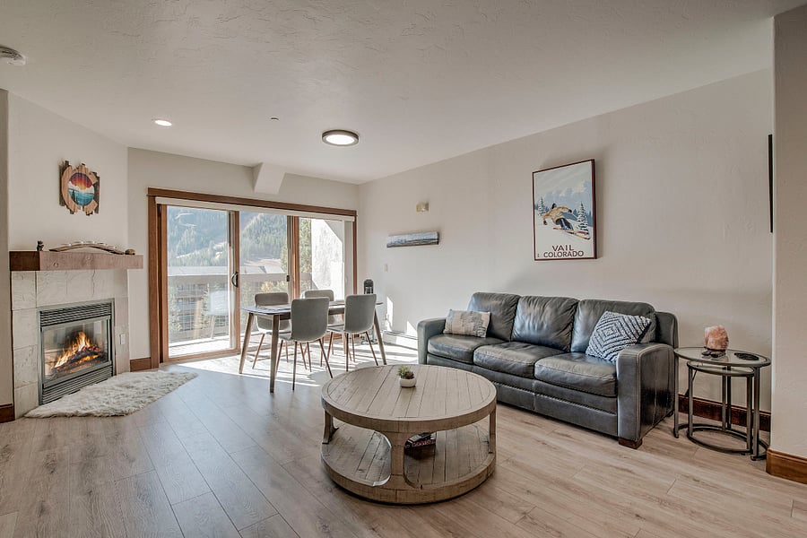 Main room, large sunny deck with mountain views