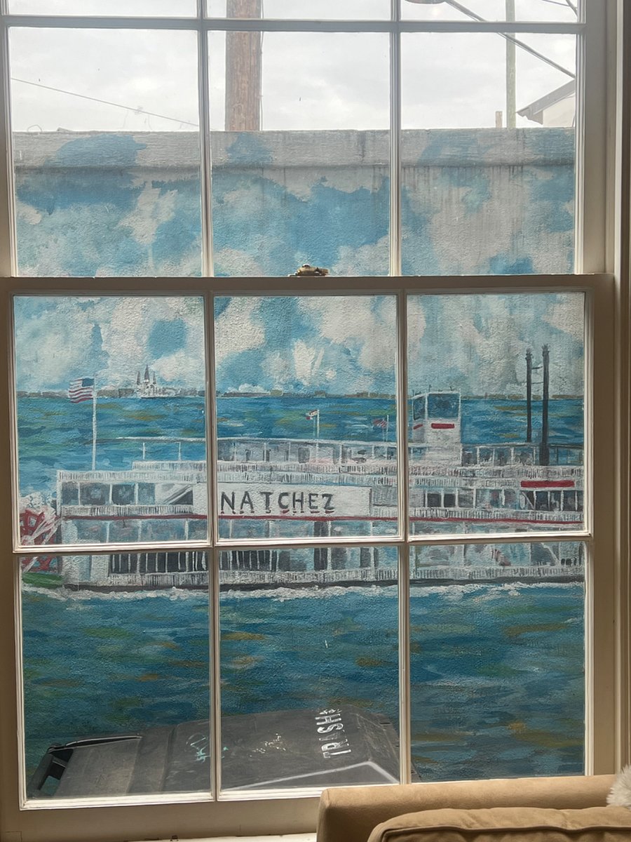 Artwork of the Natchez steamboat on the Mississippi River outside the living room window