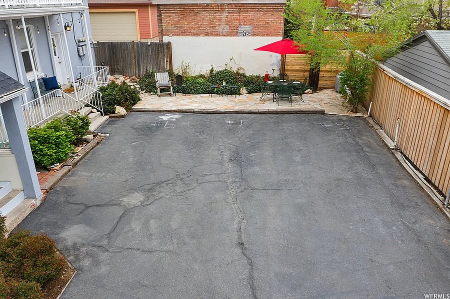 Private parking lot just steps from your door, offering safe, secure, and convenient parking in the heart of the Avenues.
