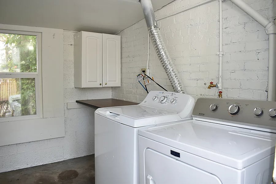 Secure laundry room with a coded door, shared bike storage, and unlimited access to free, non-coin-operated machinesconvenience at your fingertips.