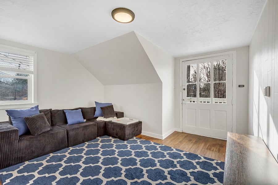 Sit back and relax on the modular couch. This room has it's own door so it can be a den, living room, or a second room.
