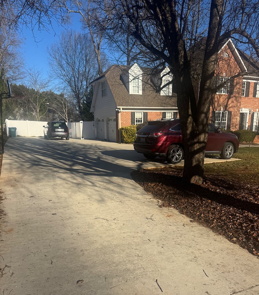 Driveway space and back gate access to get to the porch for your apartment access.