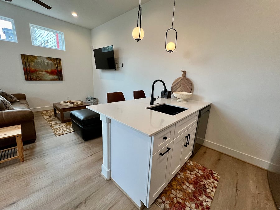 Kitchen flowing into living area