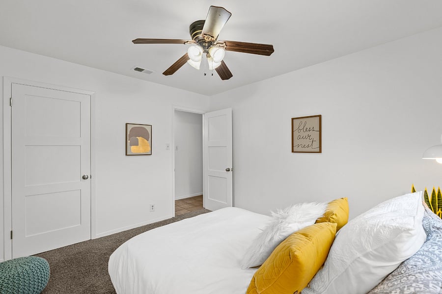 Secondary bedroom with double bed, LVP flooring