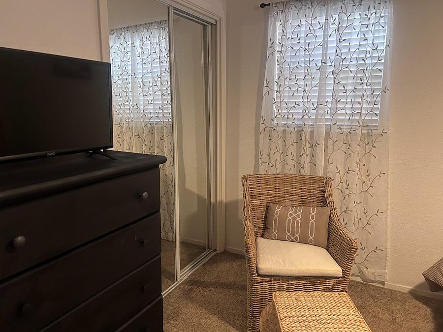 Cozy reading nook in guest bedroom