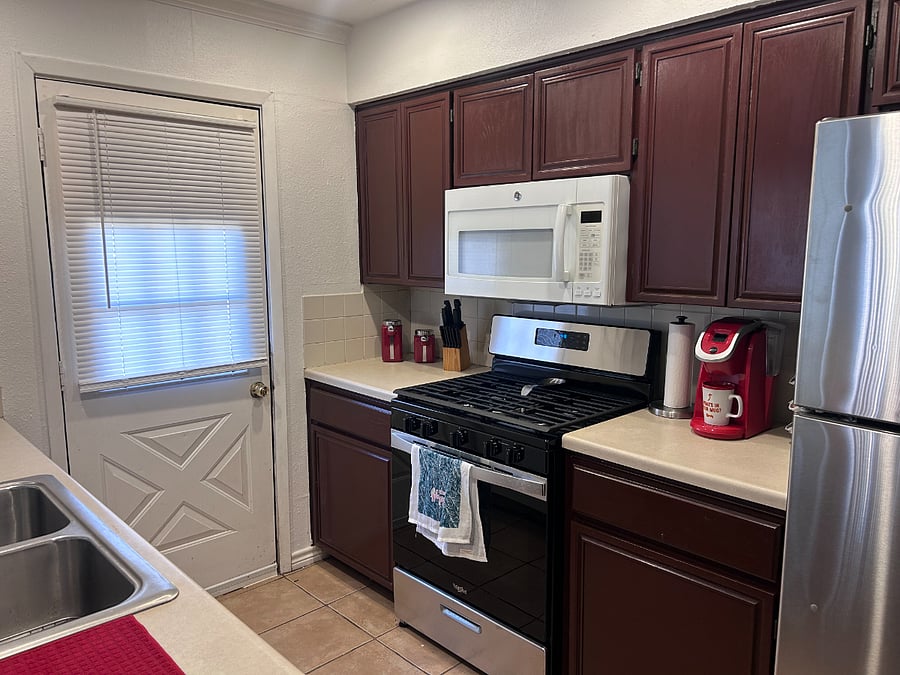 Microwave, dishwasher, full fridge with ice maker and new gas range