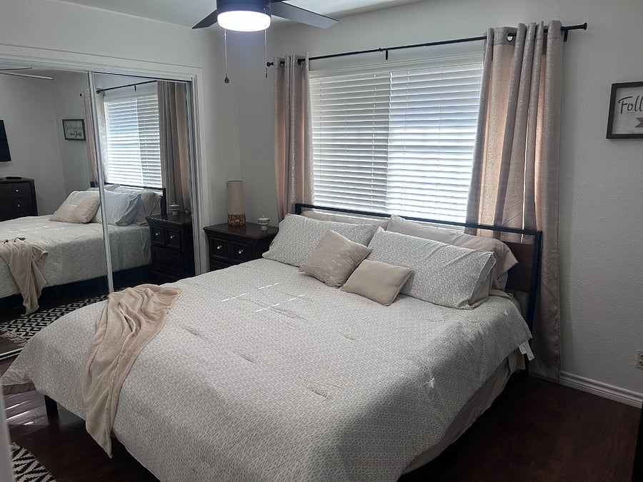 Master bedroom with king-size bed