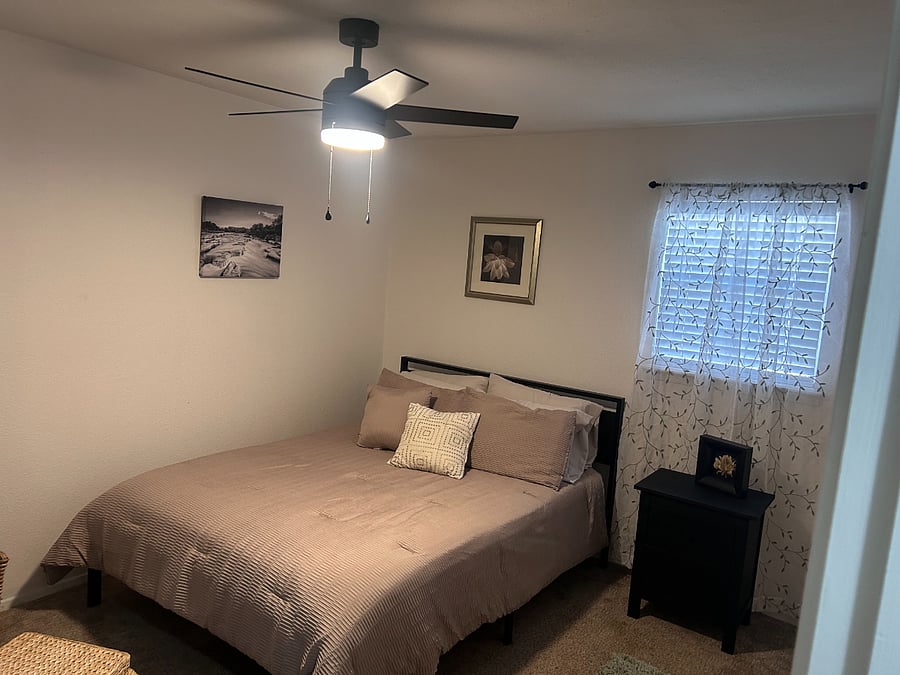 Guest bedroom with new ceiling fan