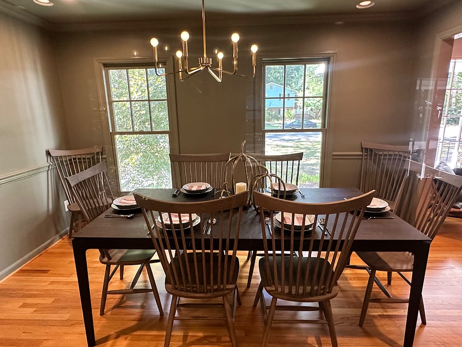 This extendable dutch designer dining table extends to fit 12 guests comfortably (with additional room for a high chair as needed).