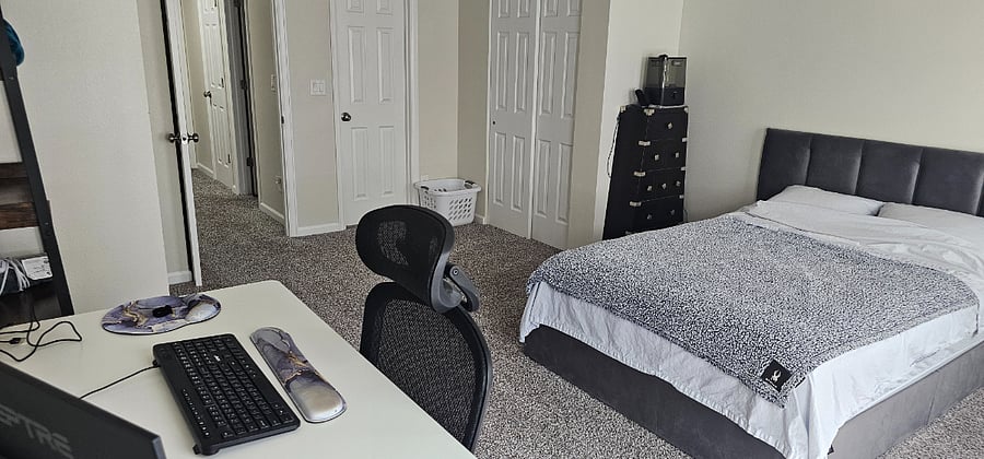 Main bedroom - view from work area to bathroom
