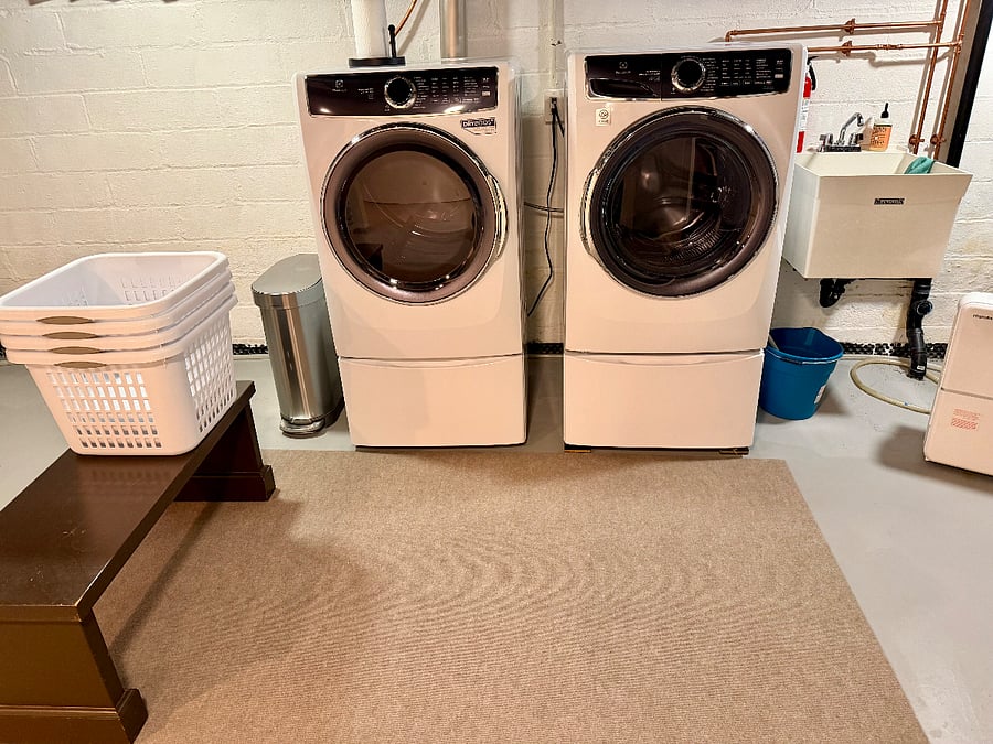 New: Electrolux washer & dryer with storage space below.