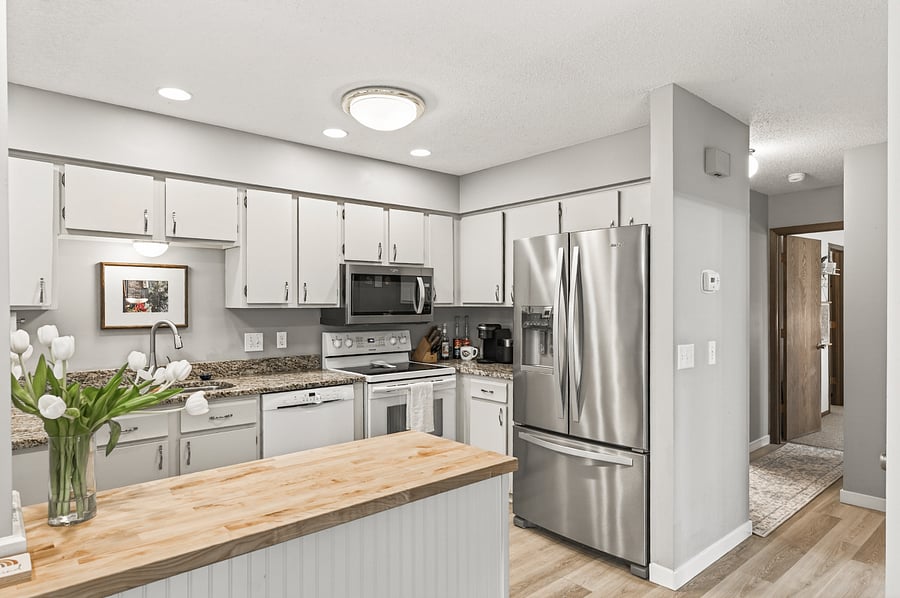 Nice size fridge, pull out freezer, keurig and added island for extra counter space.
