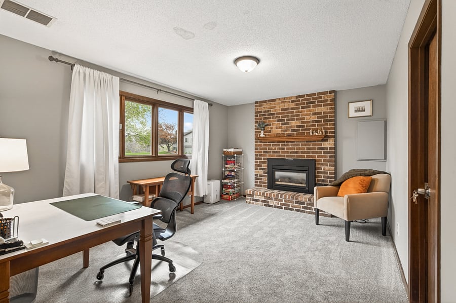 Lower level set up as an office space/bonus room.
