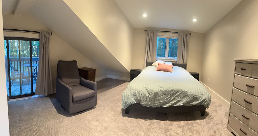 Spacious bedroom with small private patio