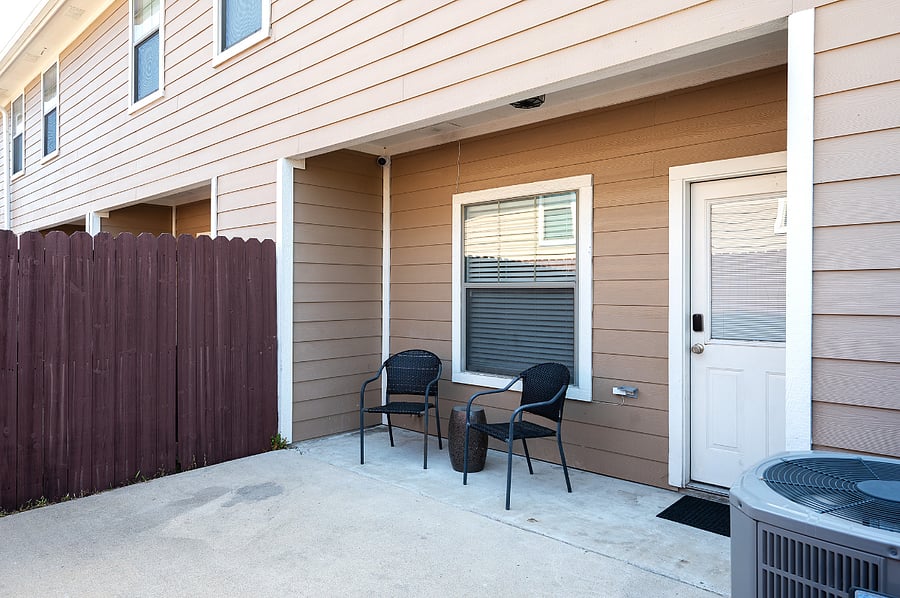Gated patio with storage.