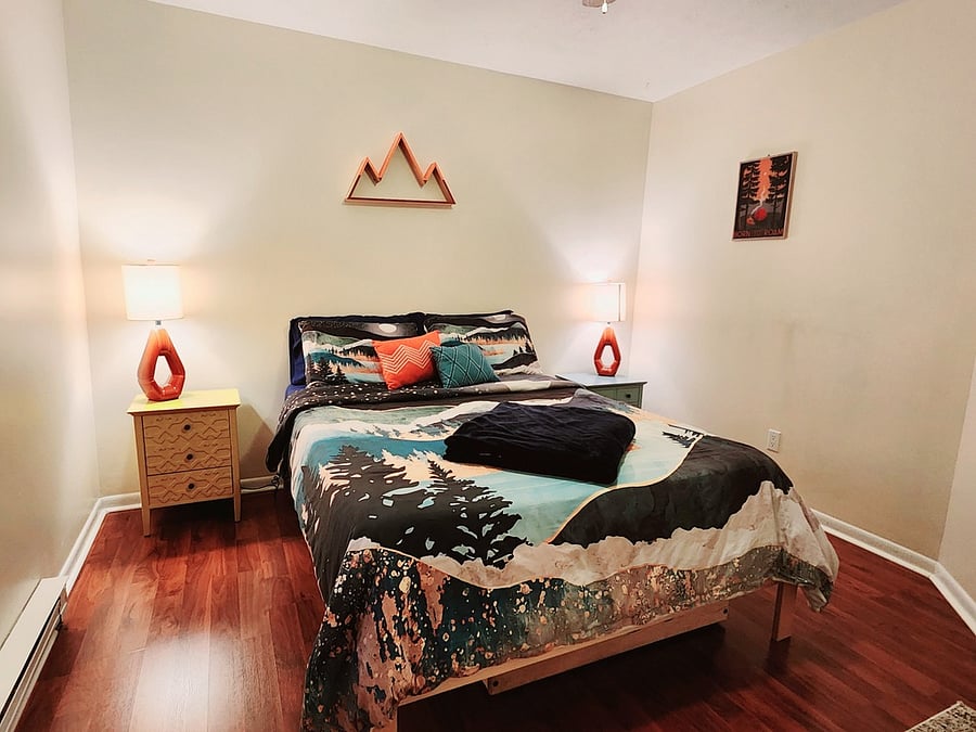 Bedroom 1: Queen bed with twin trundle