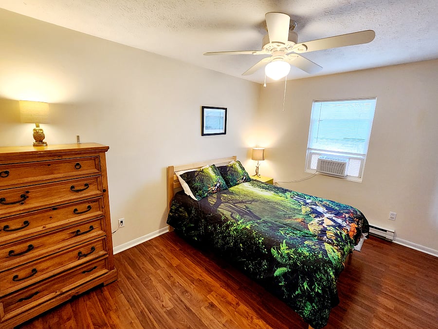 Primary Bedroom with queen bed and twin trundle, and en-suite bathroom