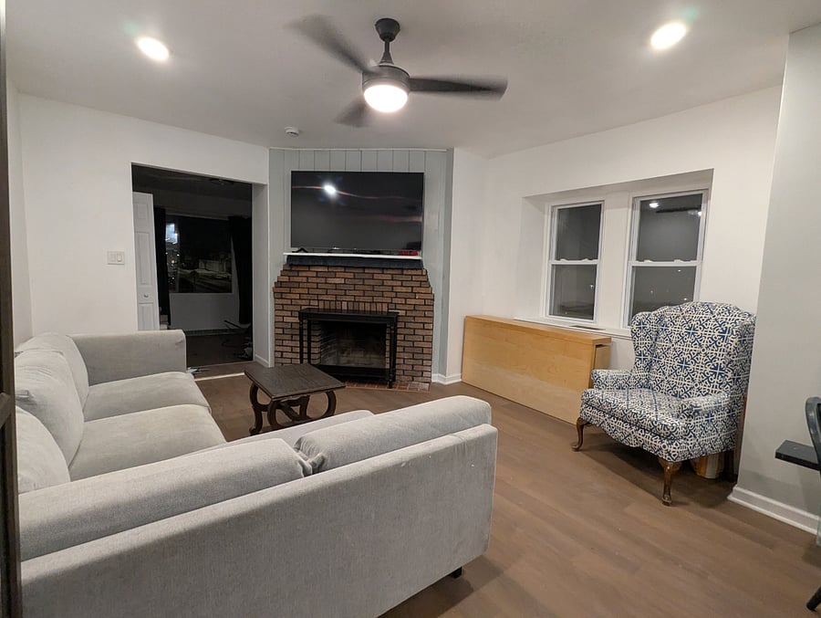 The spacious living room & foyer provides many opportunities for guests to get together.