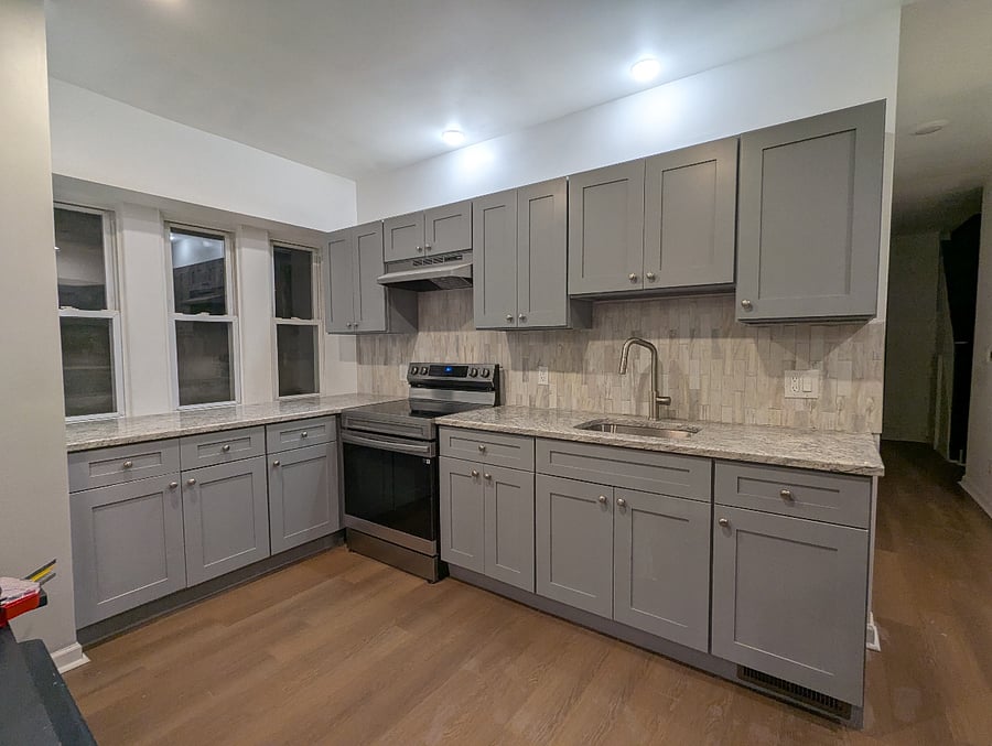 Brand new kitchen with storage cabinets assigned to each room.