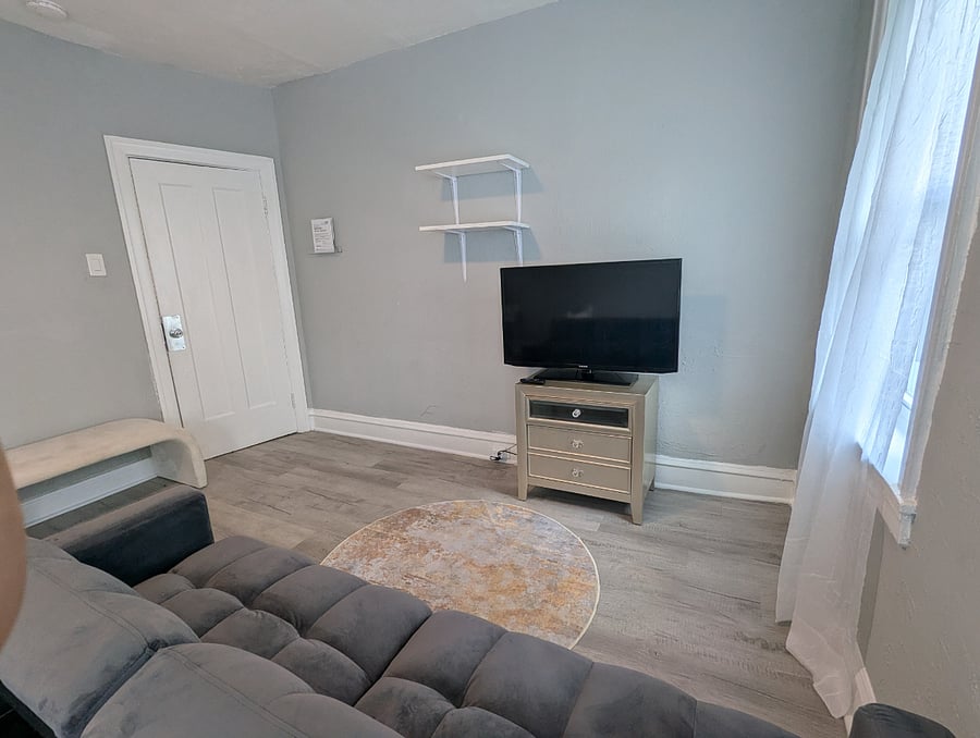 Smart TV and sofa in-bedroom provide a private place to rest and restore.