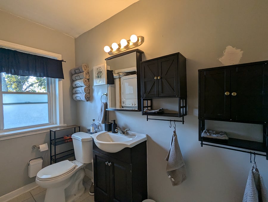 The shared bathroom includes storage, laundry and shower storage. Each bedroom is provided a separate medicine cabinet for your toiletries!