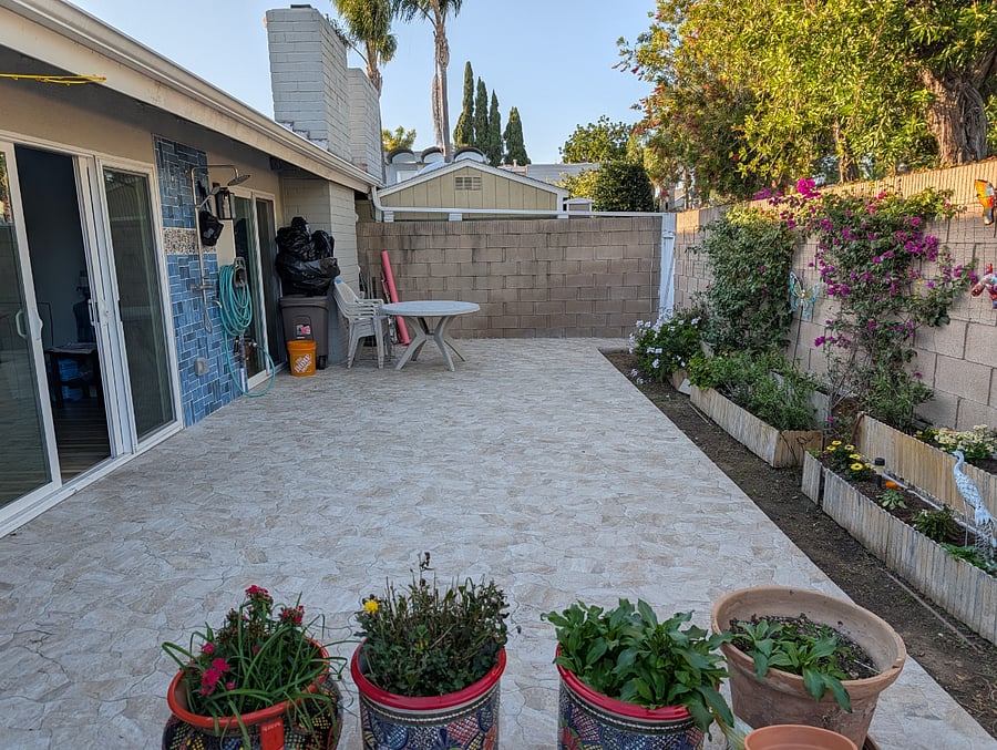 Patio w/ outdoor shower, garden gate
