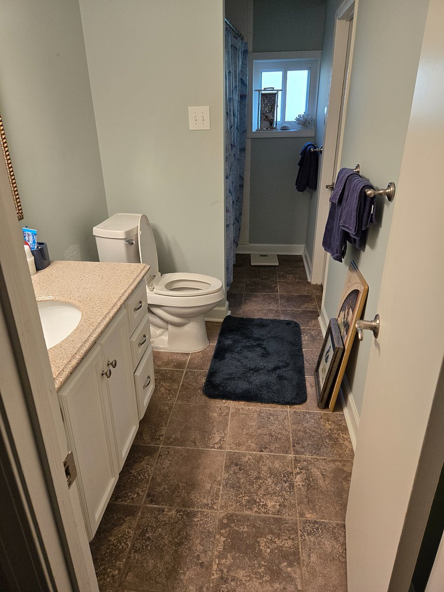 Bath- accessible from hall or bedroom