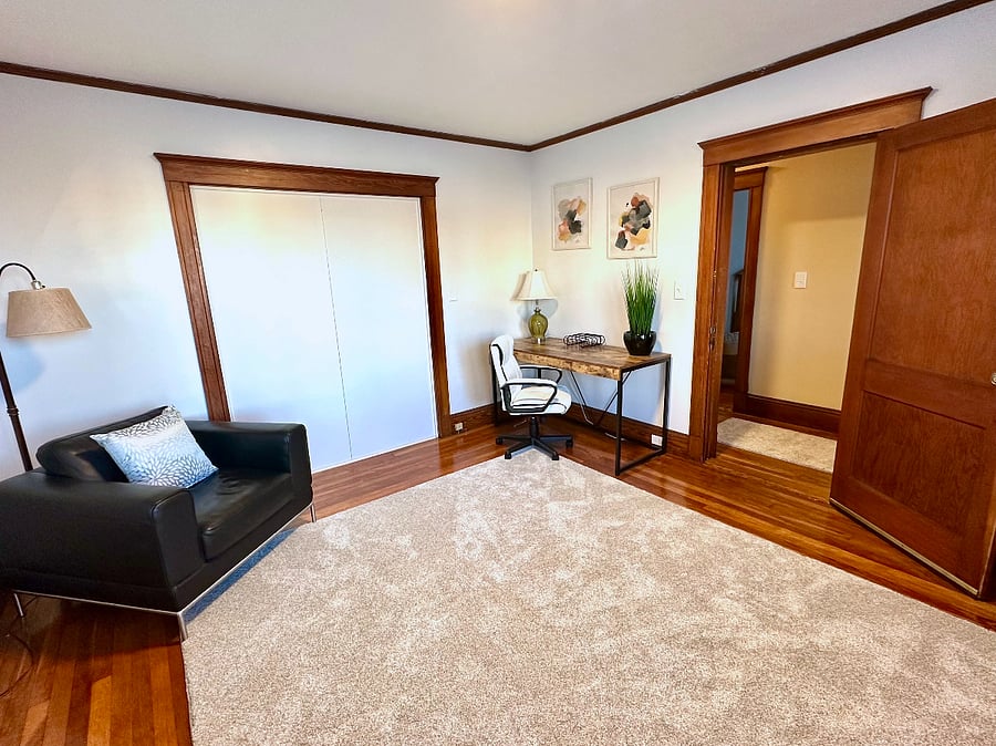 Large third room currently set up as home office, but could be used for guests, gym or whatever suits your needs. Butter soft over-sized leather chair is perfectly suited for curling up with a good book.