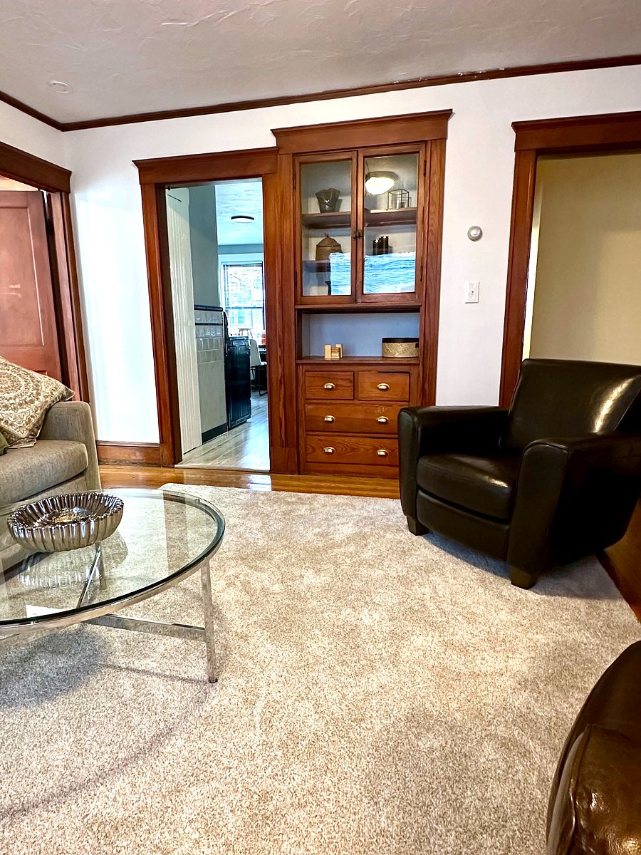 Built-in cabinets provide extra drawer storage space for linens, table coverings, serving items, electronics, cables. Upper glassed shelves perfect for displaying decor, books, artwork & pictures to make the space your own! Smart TV with ROKU.Wifi.
